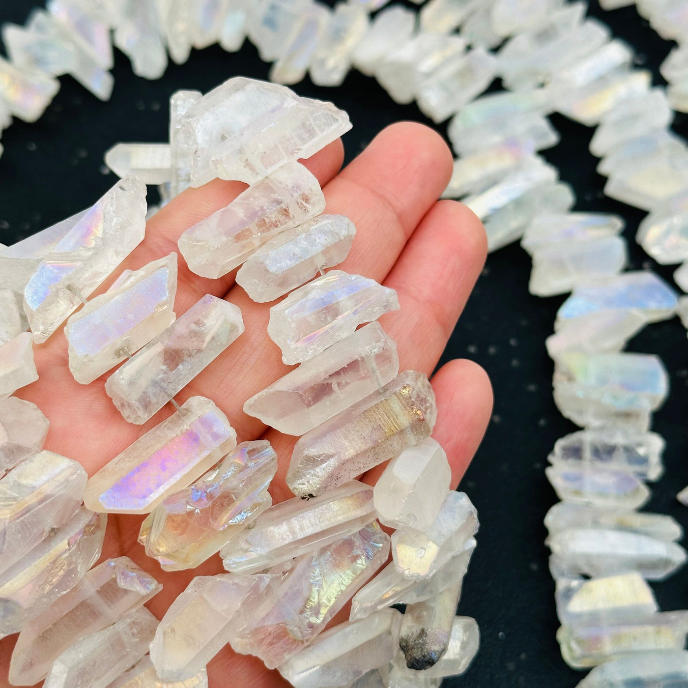 close up of the details on these angel aura crystal beads 