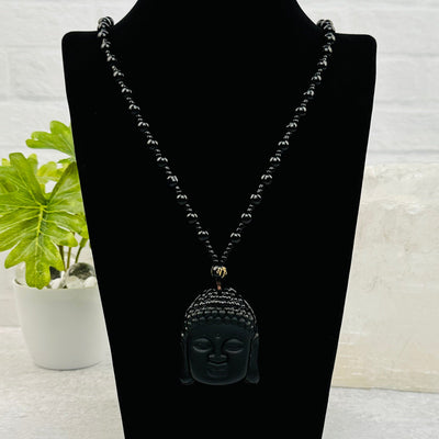Carved Gemstone Buddha Head Mala Necklace available in obsidian