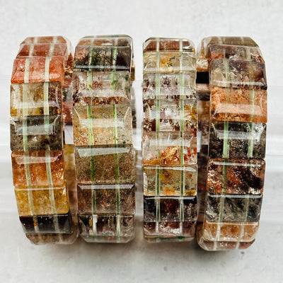 close up of the details on these garden quartz bracelets 