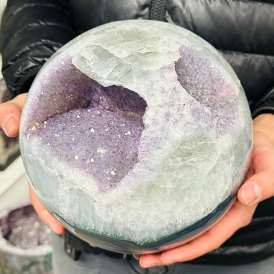 Amethyst Agate Crystal Sphere - Large Sphere in hand for size reference 