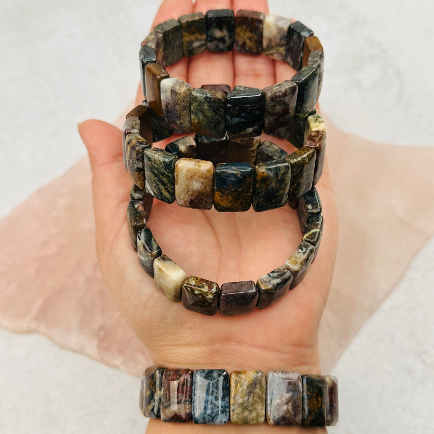 ietersite Rectangle Bead Bracelets in hand for size reference 