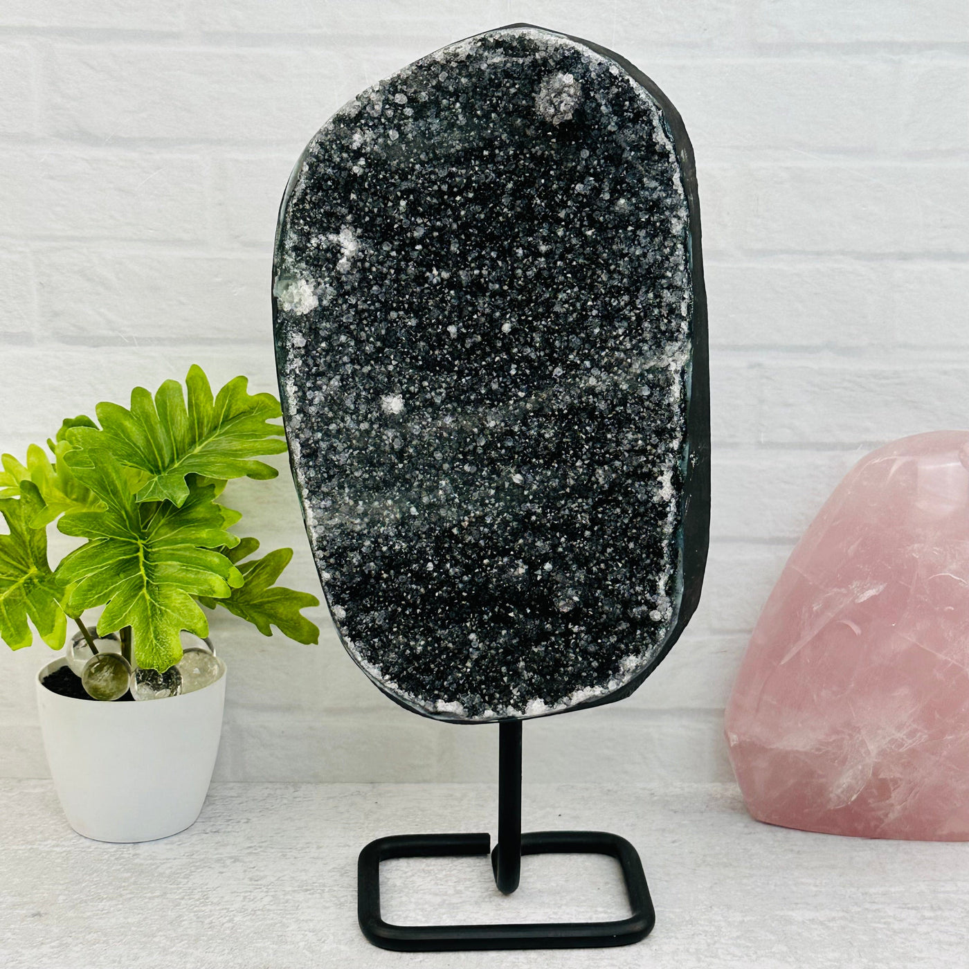 Black Amethyst Crystal Cluster on Metal Stand displayed as home decor