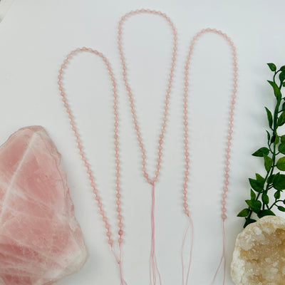 necklaces displayed to show that one side opens 