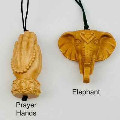 close up of the details. available in prayer hand and elephant 