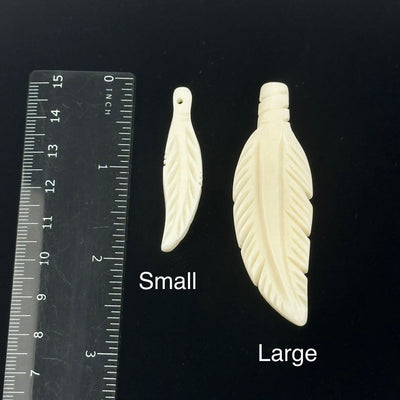 beads next to a ruler for size reference 