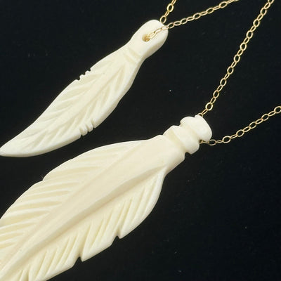 close up of how a chain can fit through these different sized beads 