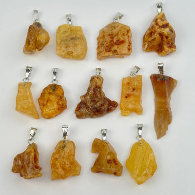 multiple pendants displayed to show the differences in the sizes and color shades 