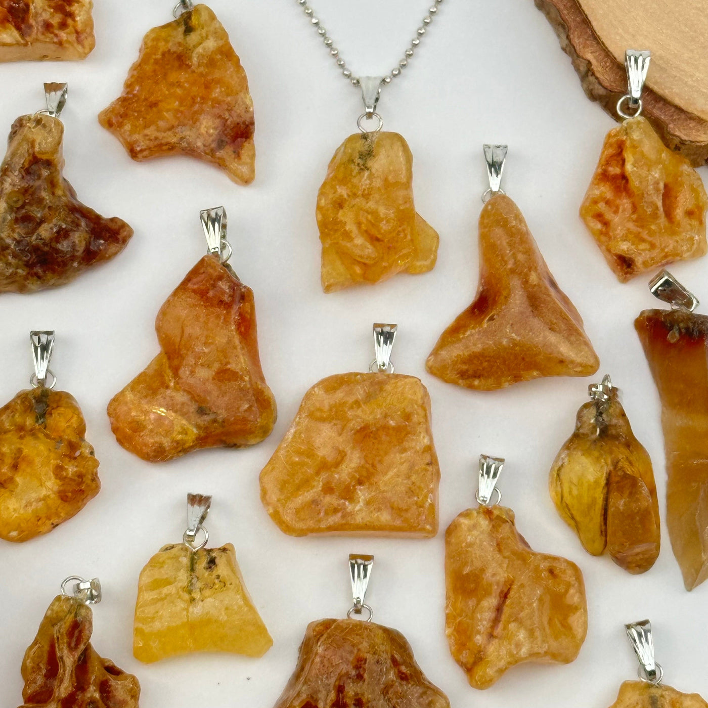 multiple pendants displayed to show the differences in the sizes and color shades 