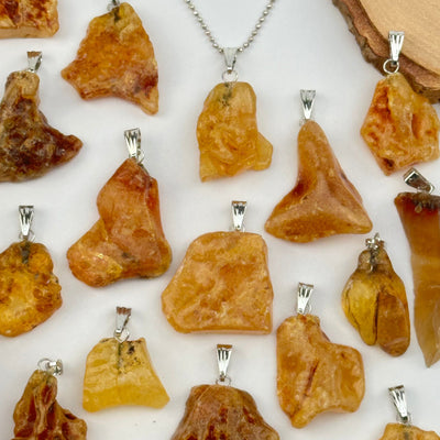multiple pendants displayed to show the differences in the sizes and color shades 