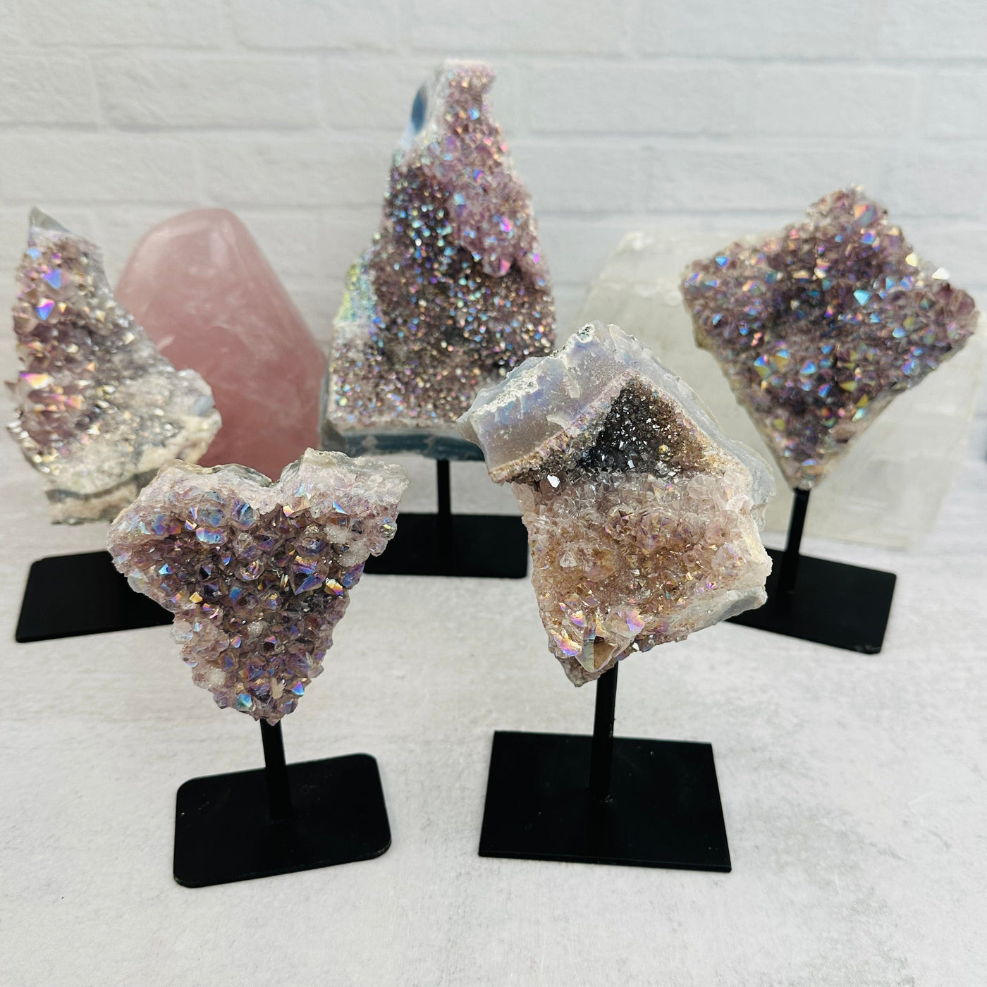 multiple crystals displayed to show the differences in sizes and color shades 