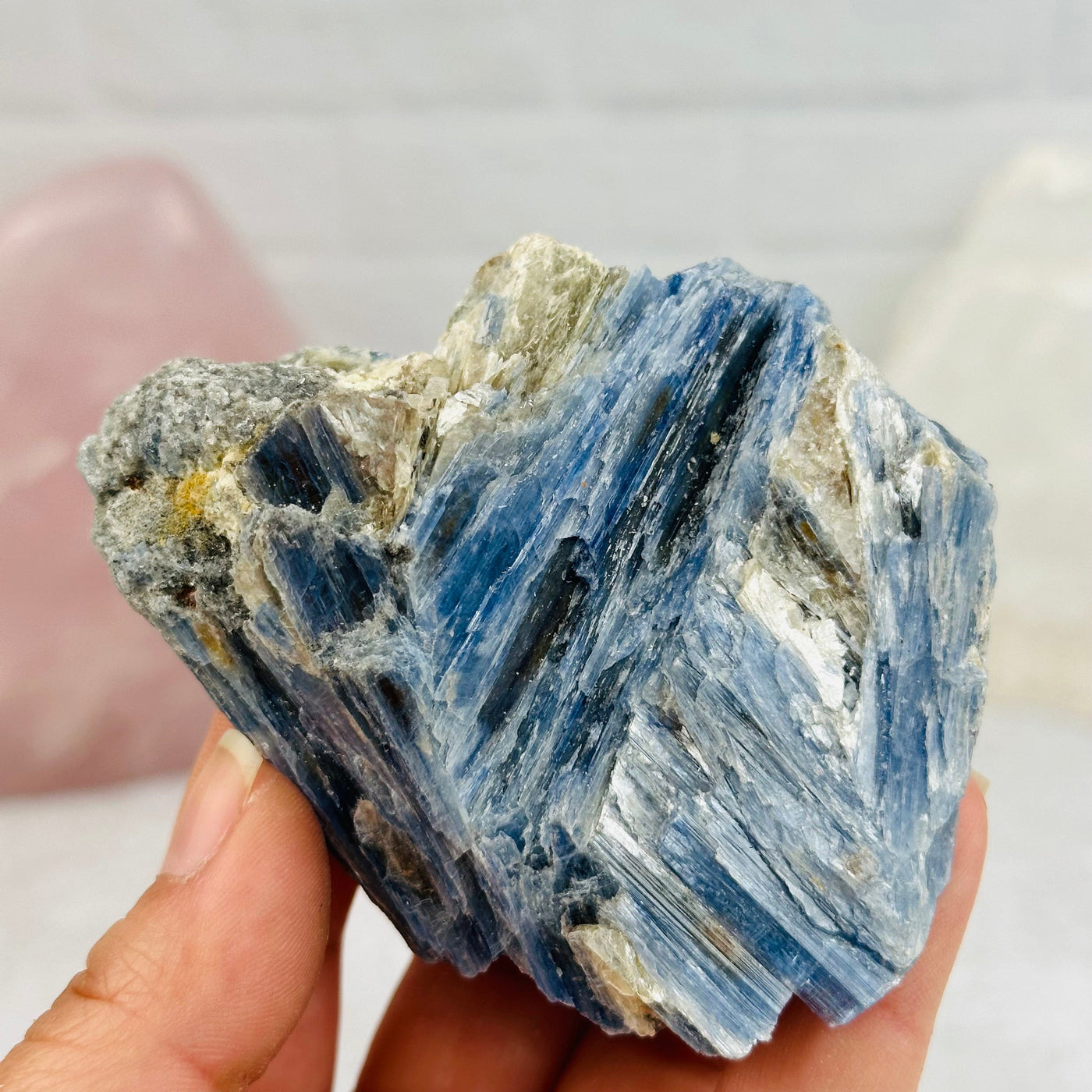 kyanite in hand for size reference 