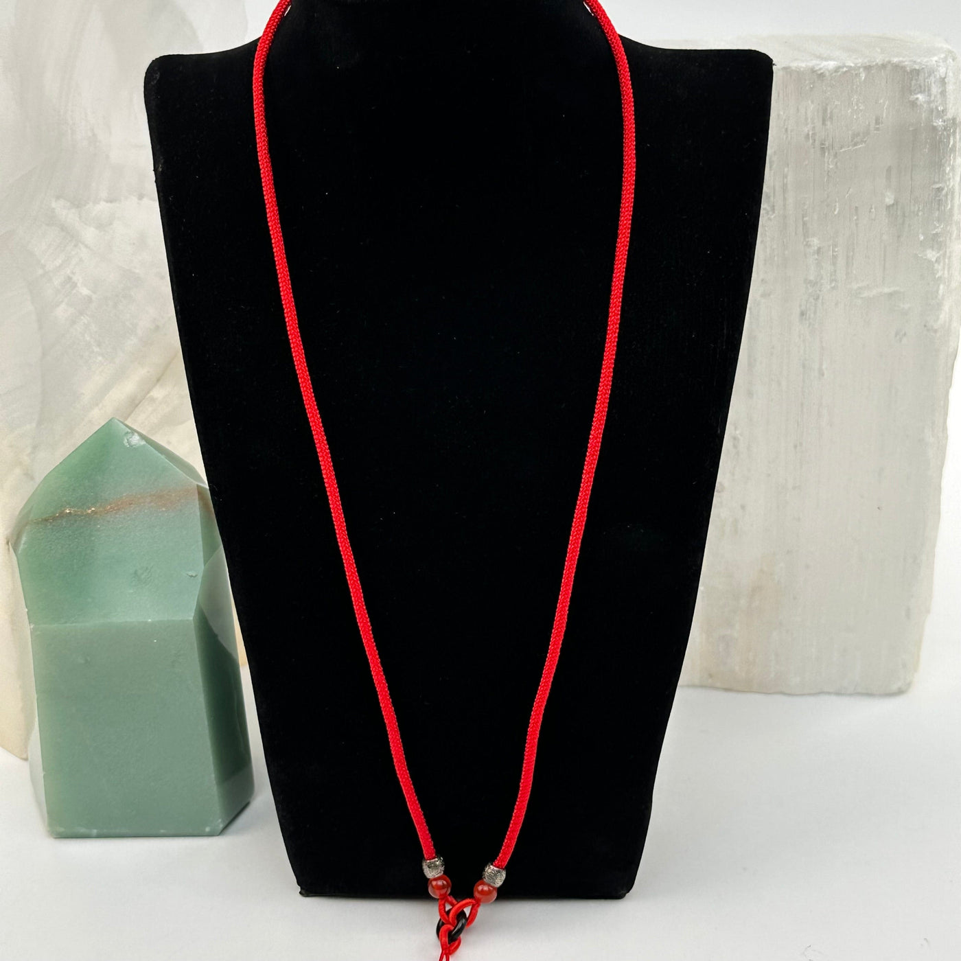 necklace displayed to show how it hangs. available with a carnelian beads