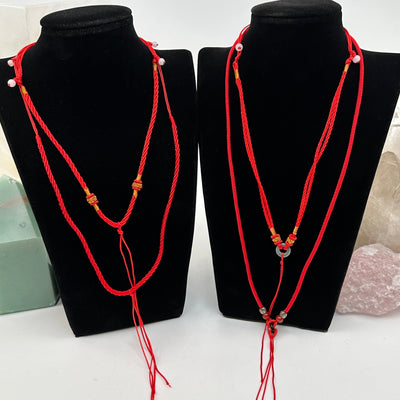 necklace displayed to show how they hang