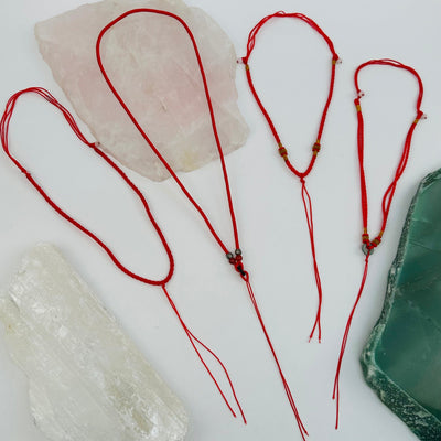 necklaces displayed to show the differences in the styles available 