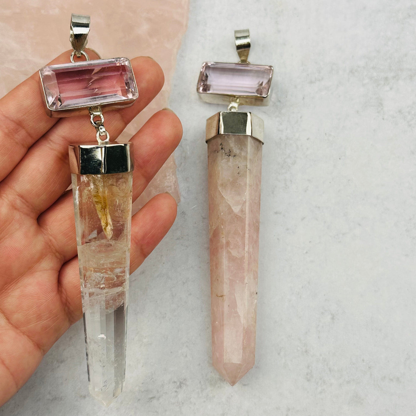 one crystal quartz pendants available. in hand for size reference 