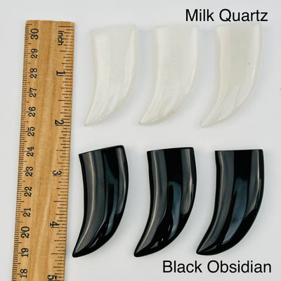 crystal horn cabochons displayed next to a ruler for size reference 
