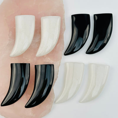 multiple crystal horn beads displayed to show the differences in the crystals available 