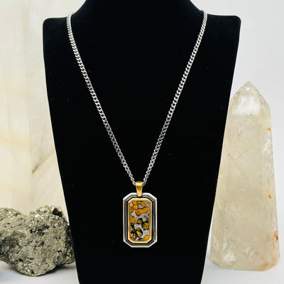 Sericho Pallasaite Meteorite Crystal Necklace displayed to show how it hangs 