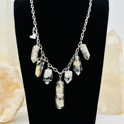 lodolite charm crystal necklace displayed to show how it hangs 