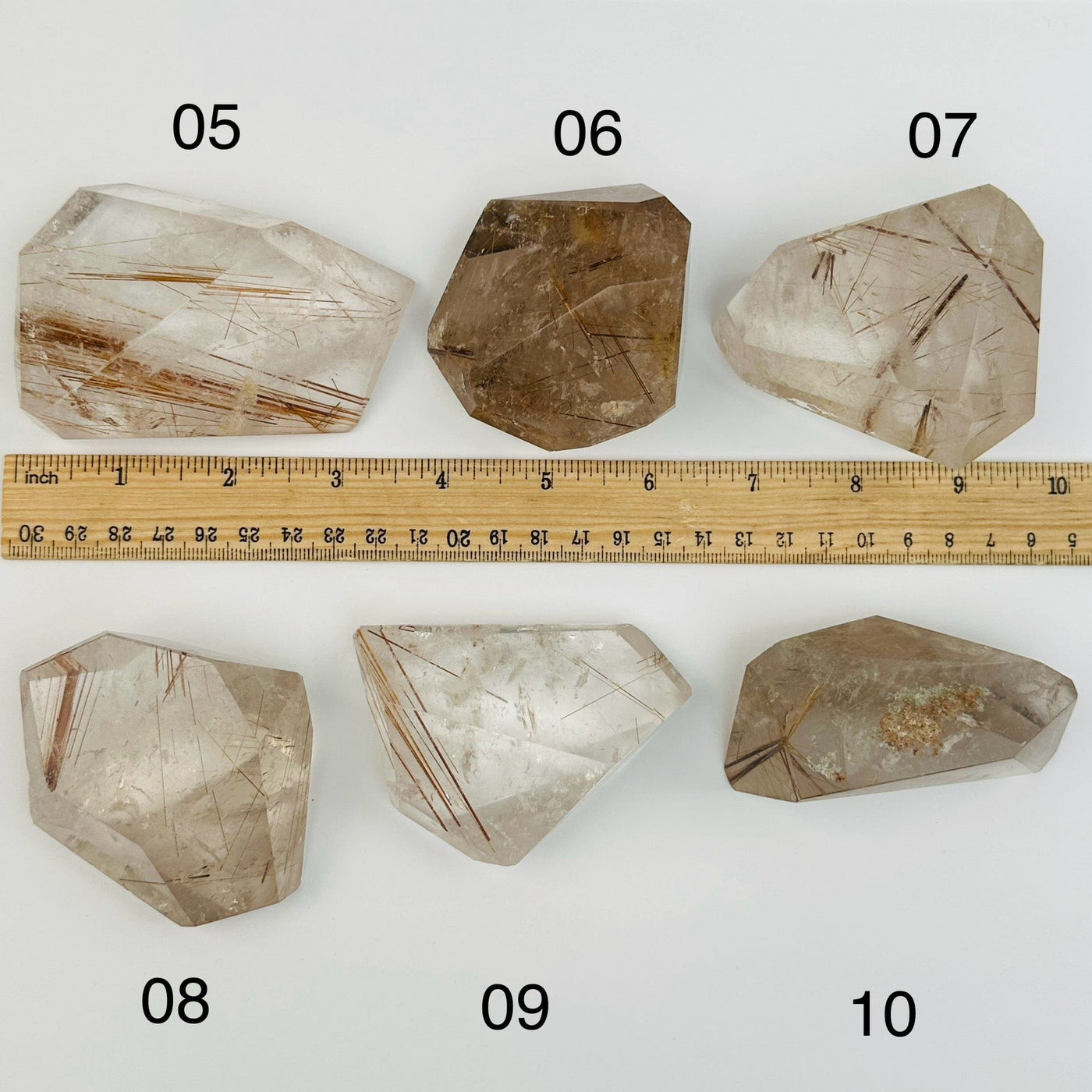 Rutilated Crystal Quartz - High Quality - You Choose - next to a ruler for size reference