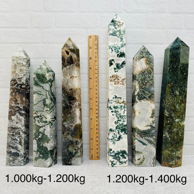 Moss Agate Tower Point - By Weight - next to a ruler for size reference 