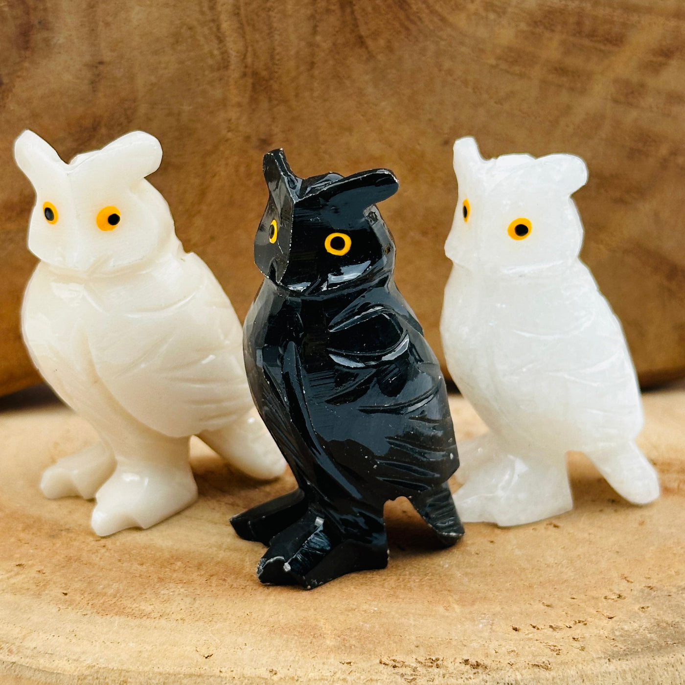 soapstone crystal owl displayed to show the differences in the color shades 