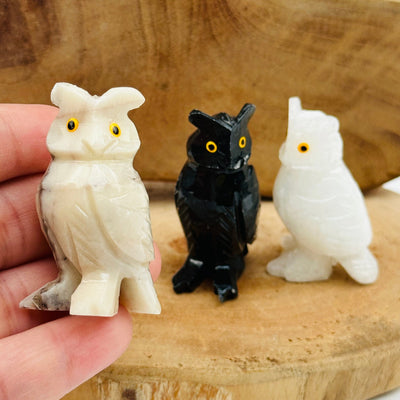 soapstone crystal owl in hand for size reference 