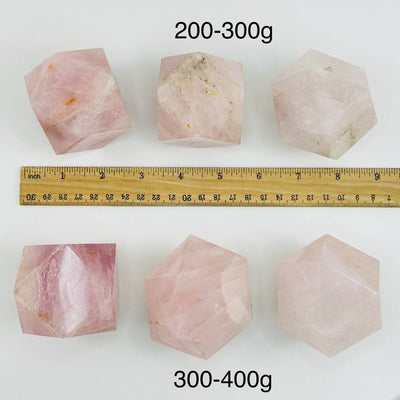 Rose Quartz Geometric Shape - By Weight - next to a ruler for size reference 