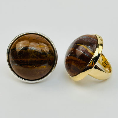 close up of the details on these tigers eye crystal rings 