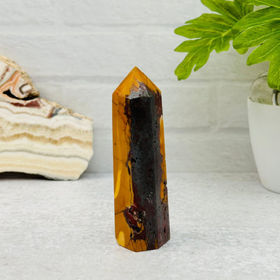 Mookaite Polished Point displayed as home decor 