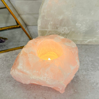 rose quartz candle holder displayed as home decor
