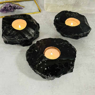 multiple candle holders displayed to show the differences in the sizes 