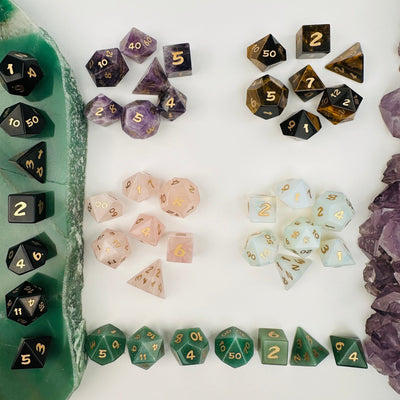 multiple dice sets displayed to show how the differences in the crystal types
