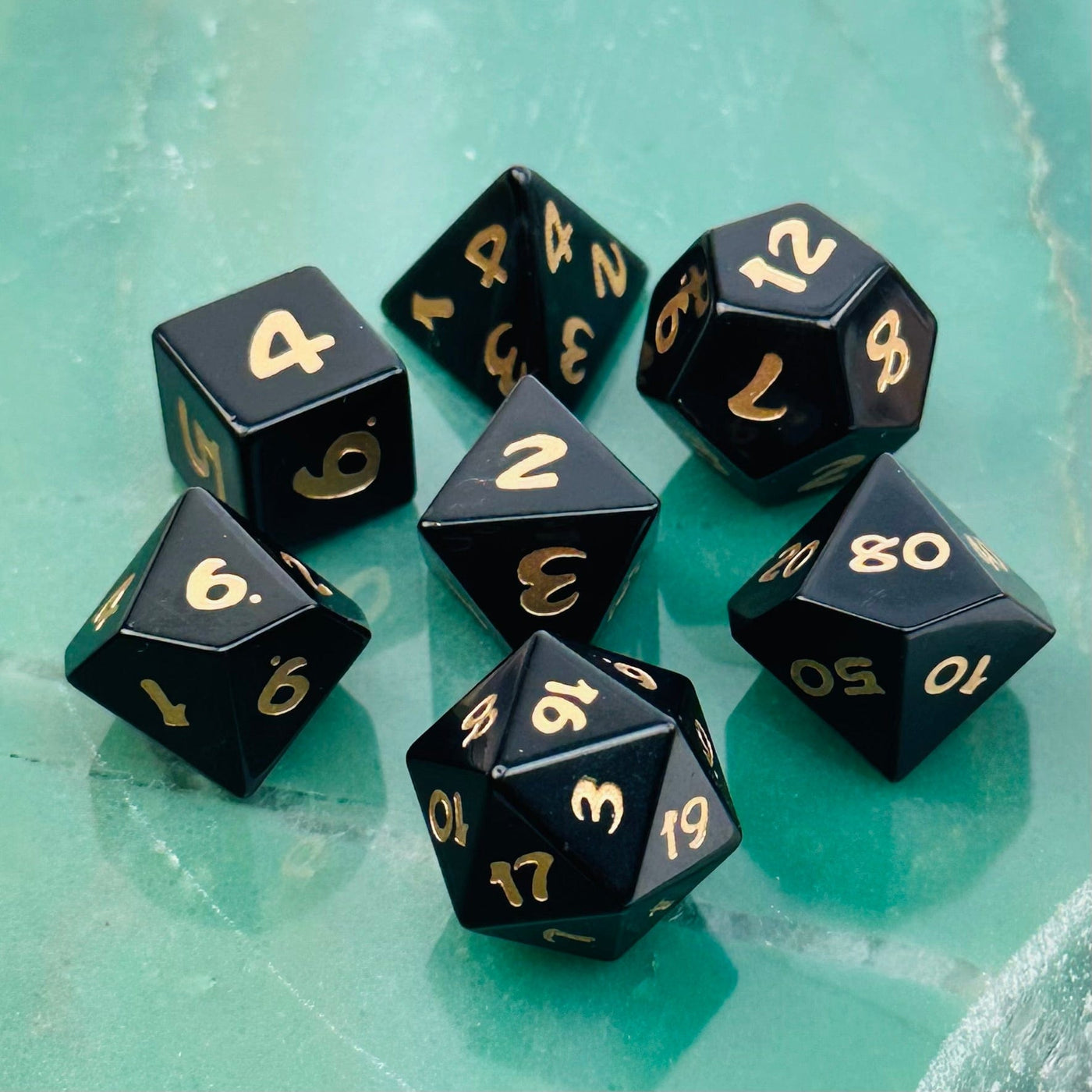 close up of the details on this crystal dice  set