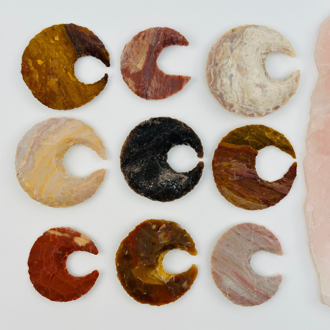 multiple moon crescents displayed to show the differences in the sizes and color shades 
