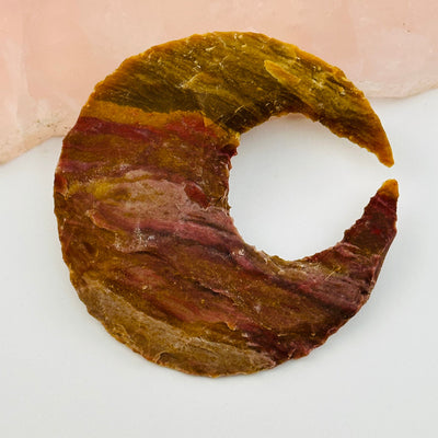 close up of the details on this jasper crystal crescent