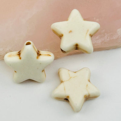 close up of the details on these star beads 