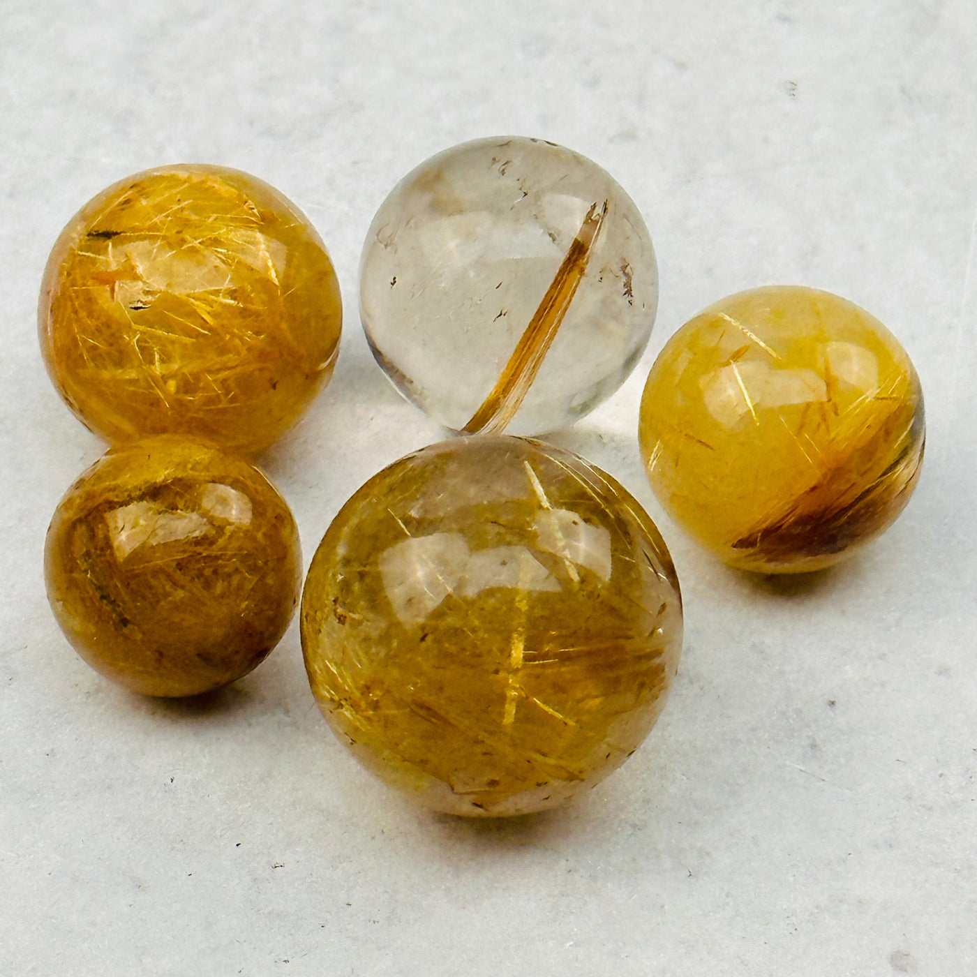 close up of the rutile details on these spheres 