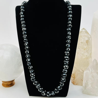 necklace displayed to show how it hangs 