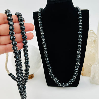 close up of the details on the ceramic beads on this necklace