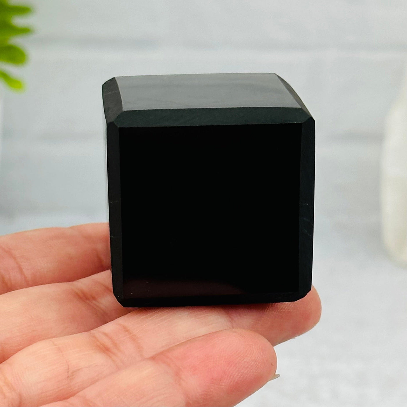 3cm shungite cube in hand for size reference 