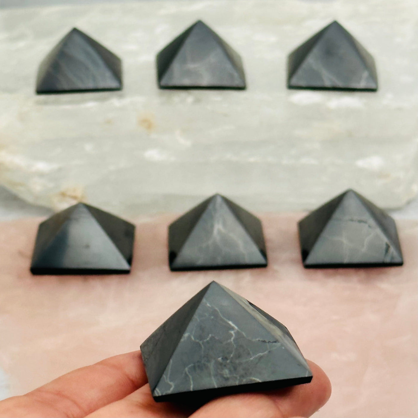 Shungite Pyramid in hand for size reference 