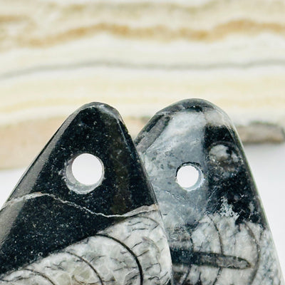 close up of the drilled holes on these beads