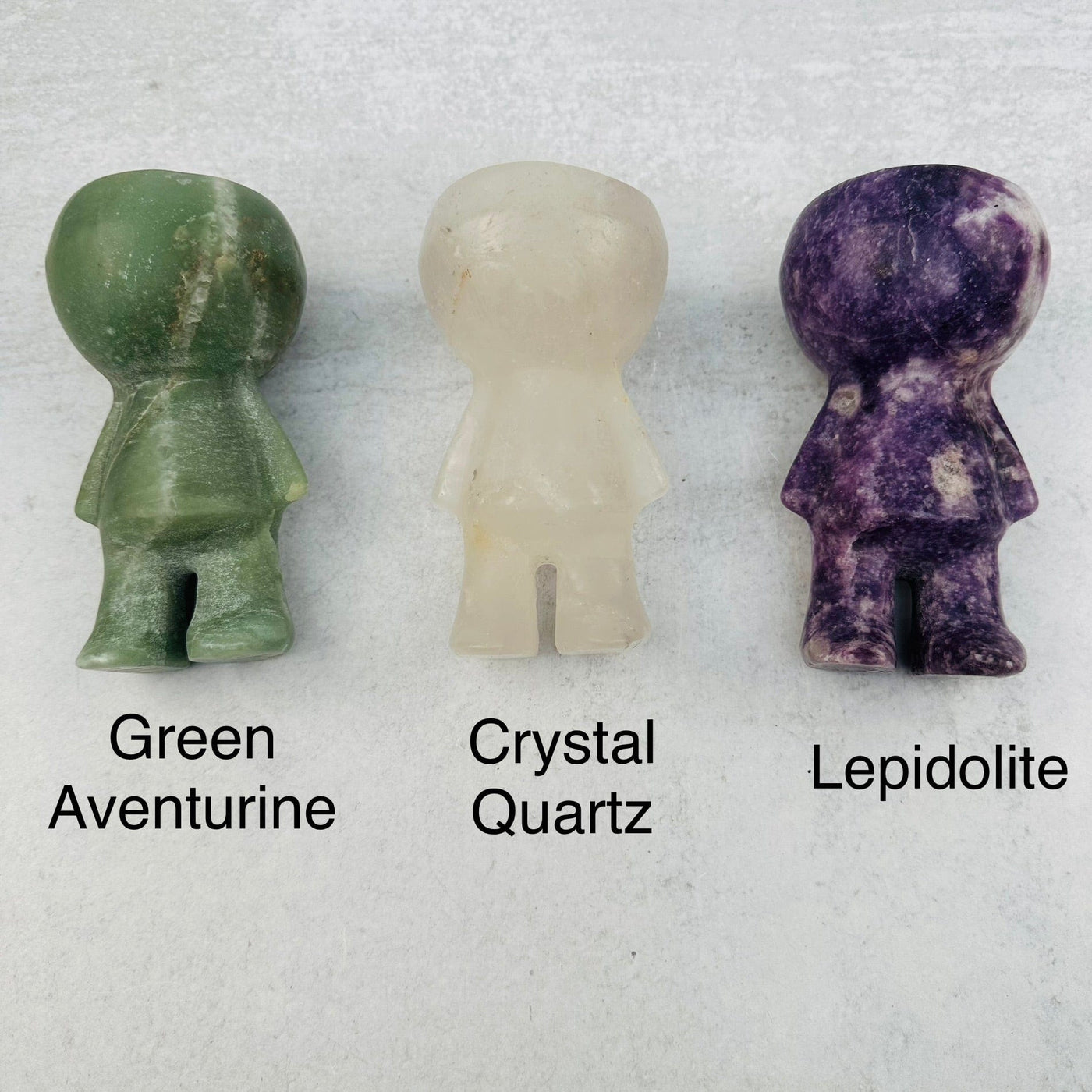 Carved Gemstone Plant Person next to their crystal name 
