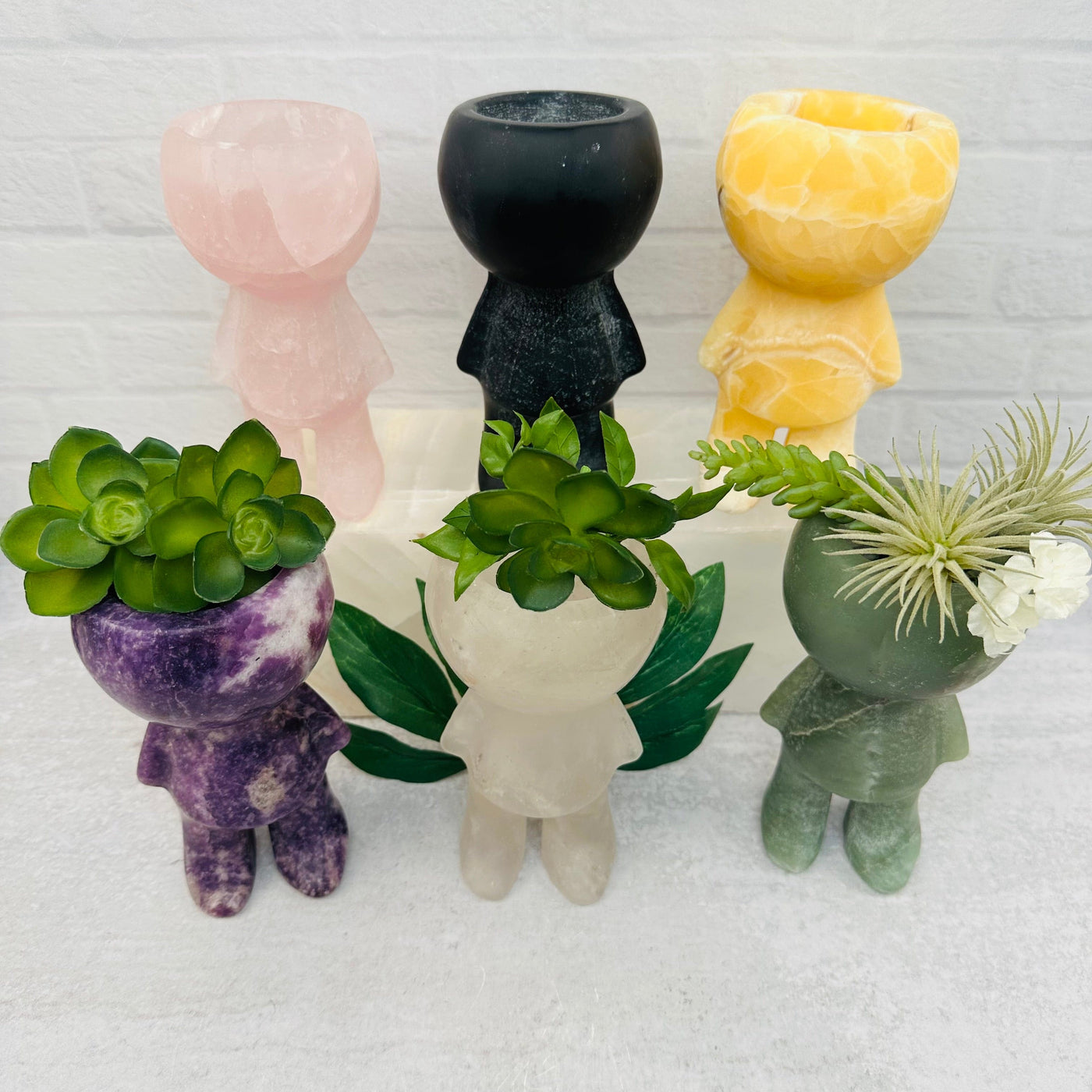 hand carved plant people 
