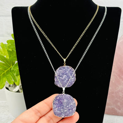 Amethyst Crystal Cluster Necklace in hand for size reference 