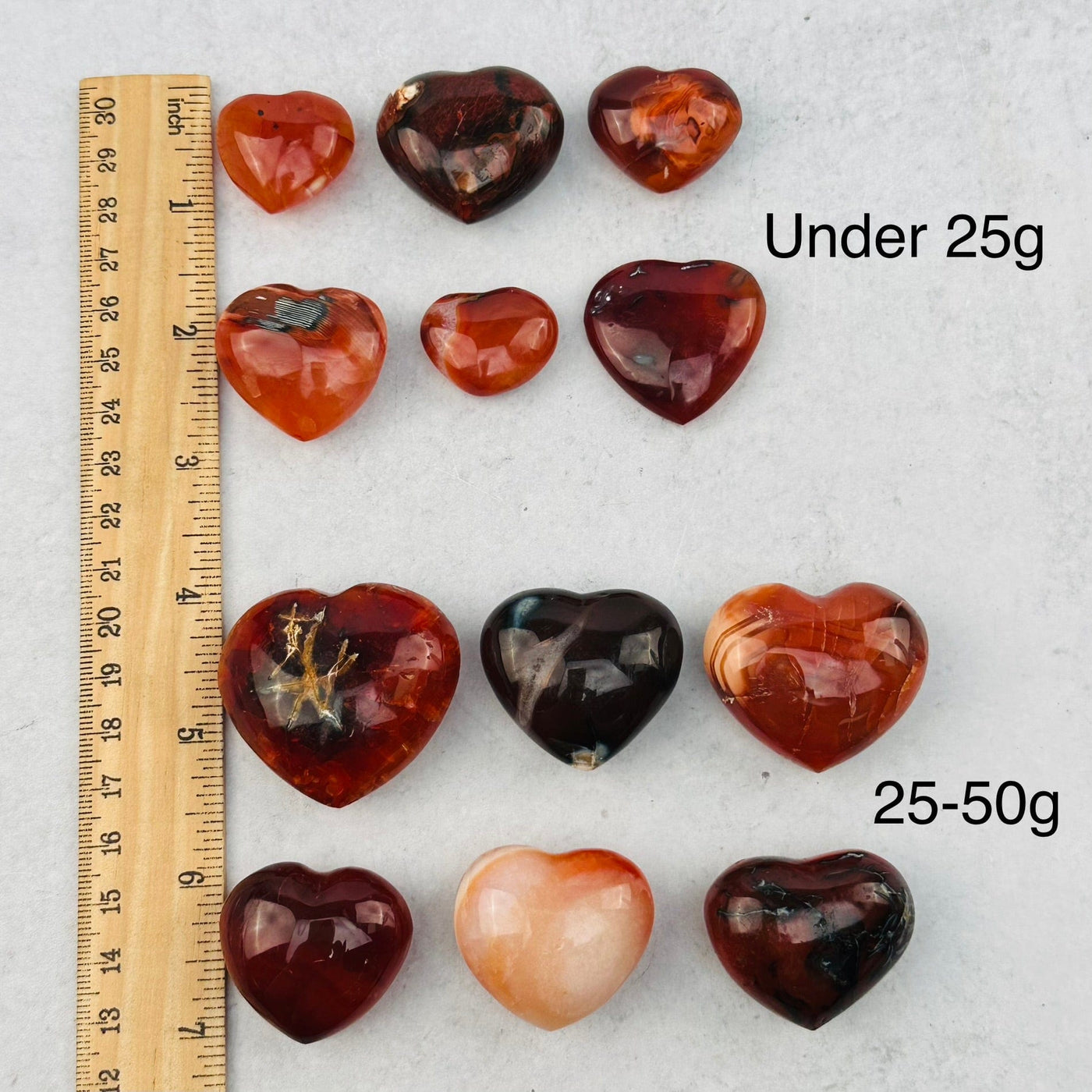 Carnelian Heart - CHOOSE WEIGHT - next to a ruler for size reference 