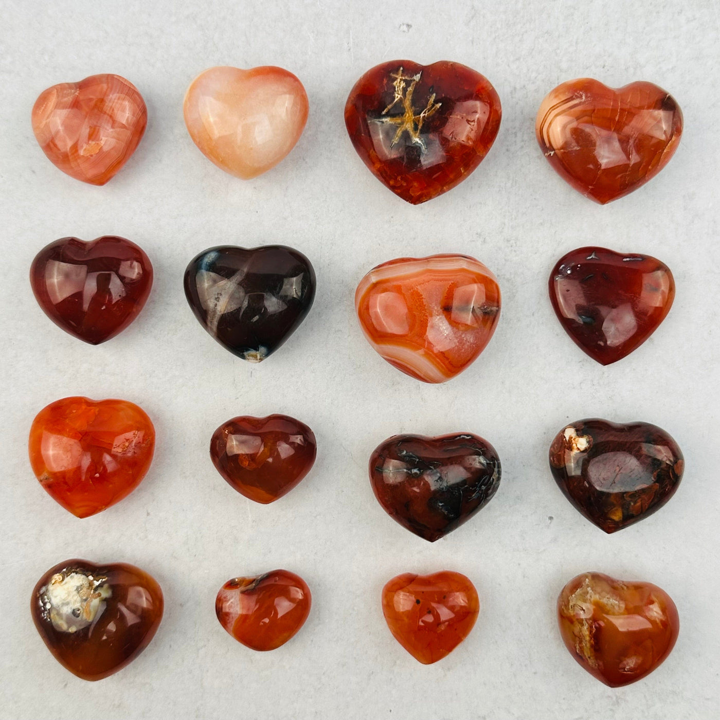 multiple hearts displayed to show the differences in the sizes and color shades 