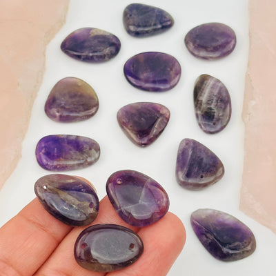 crystal beads in hand for size reference 