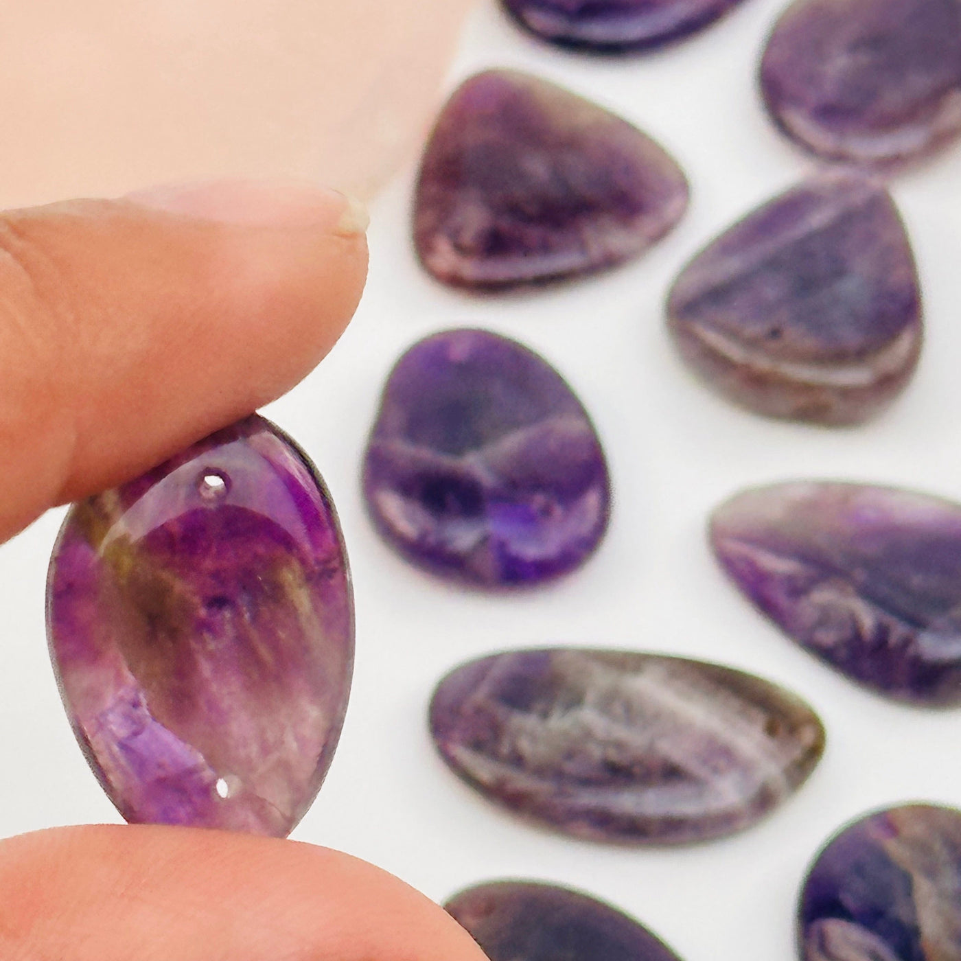 close up of the drilled holes on this bead 